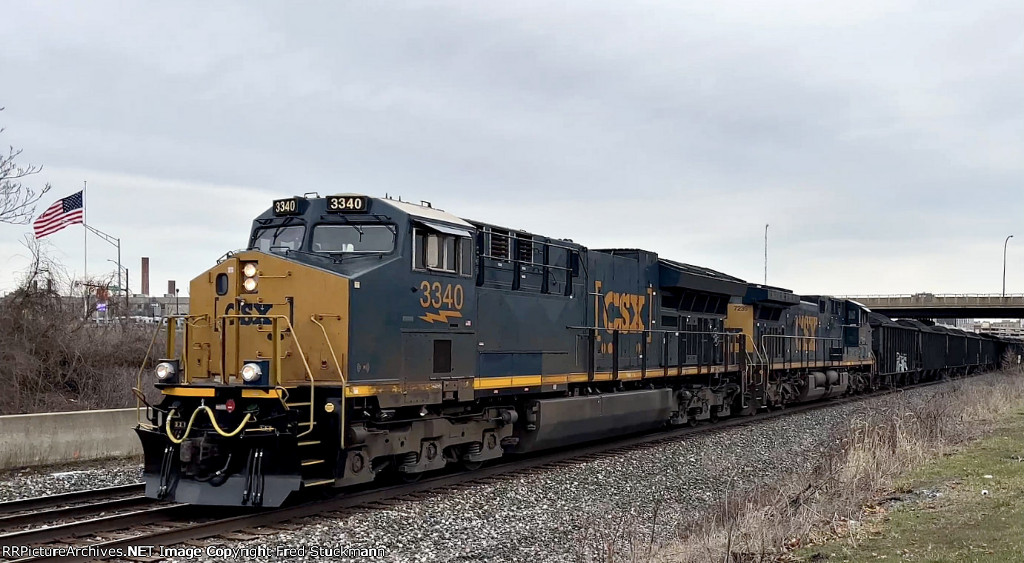 CSX 3340 leads coal out of town.